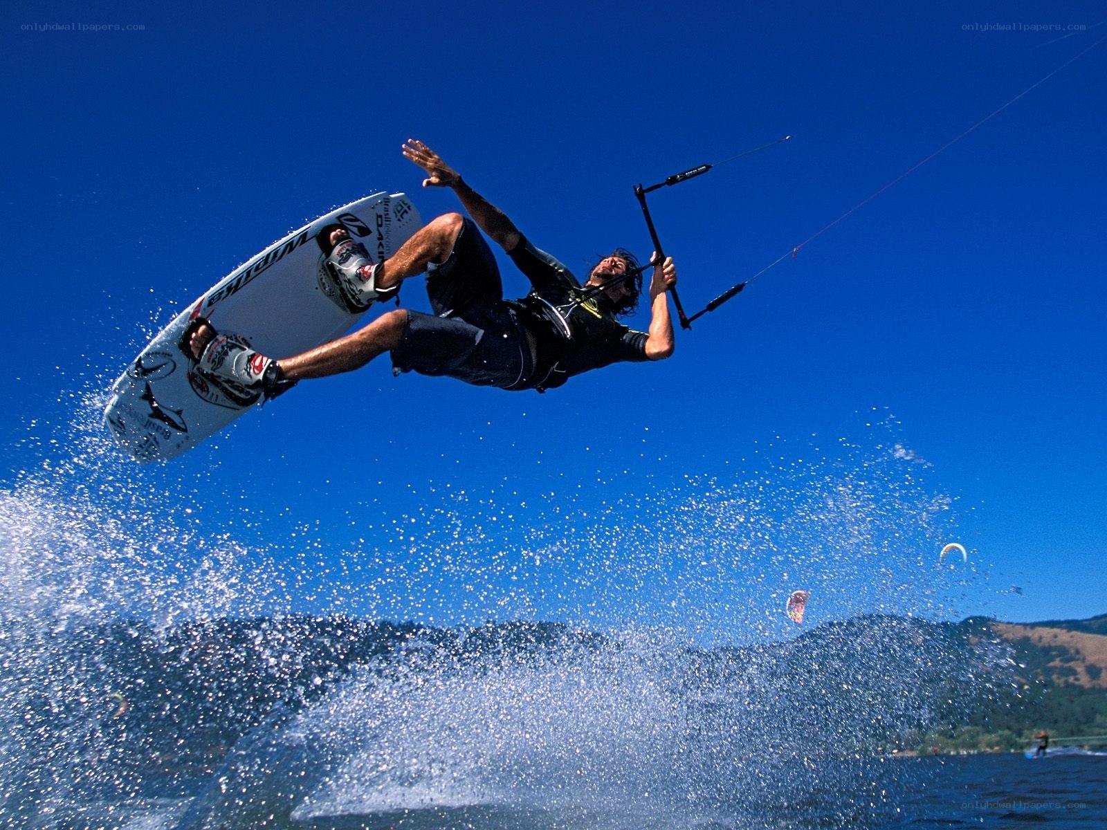 kiteboarder performing aerial trick