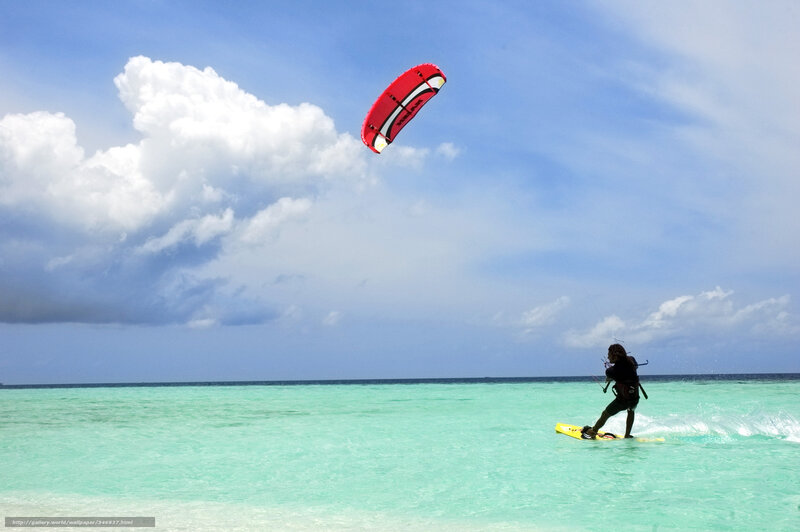 kiteboarding in turquoise water
