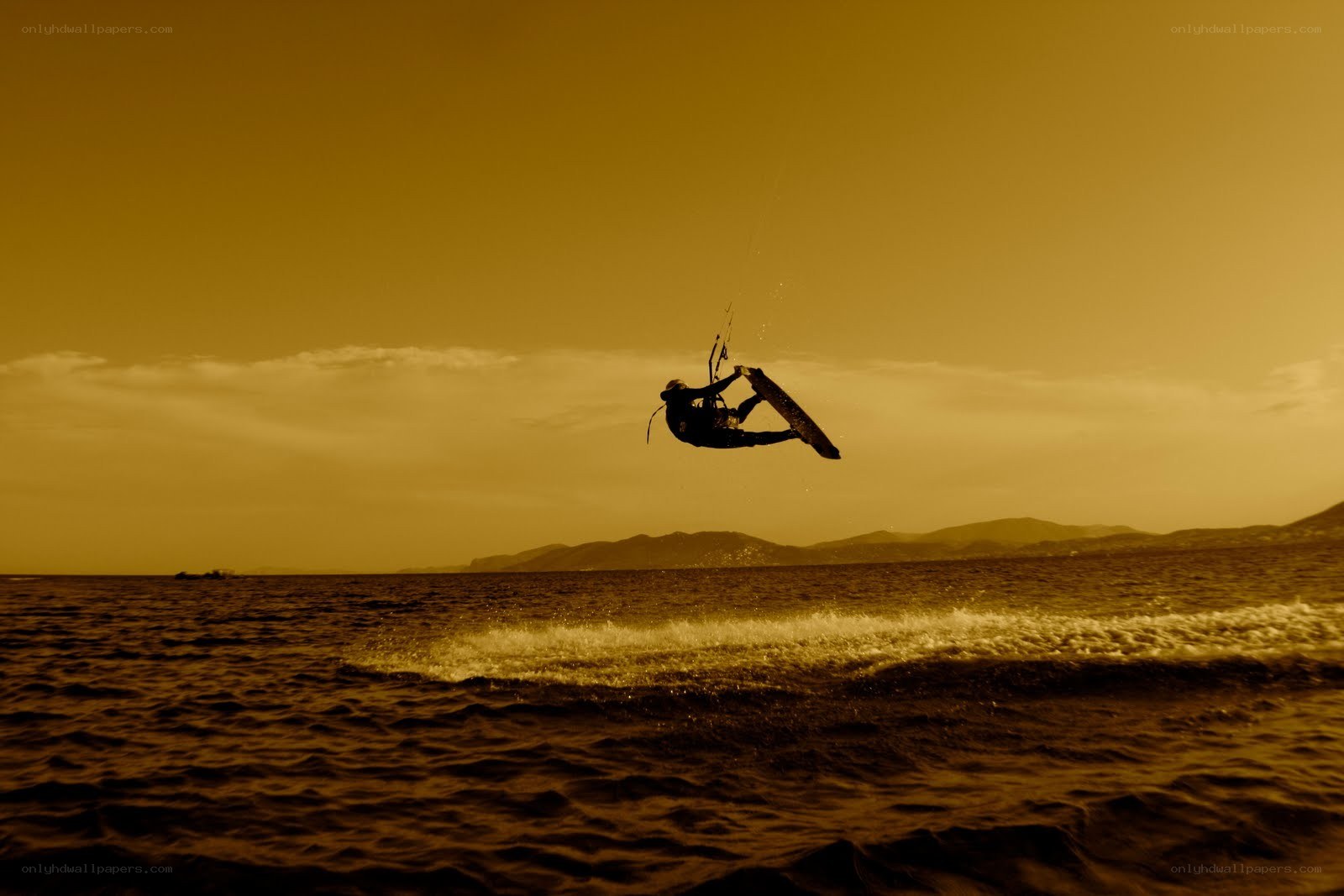 kitesurfer in mid-air jump