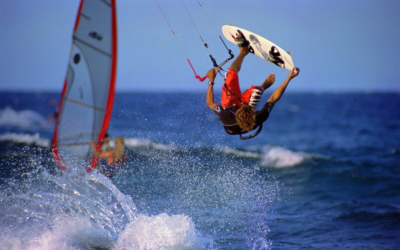 kitesurfer performing aerial trick