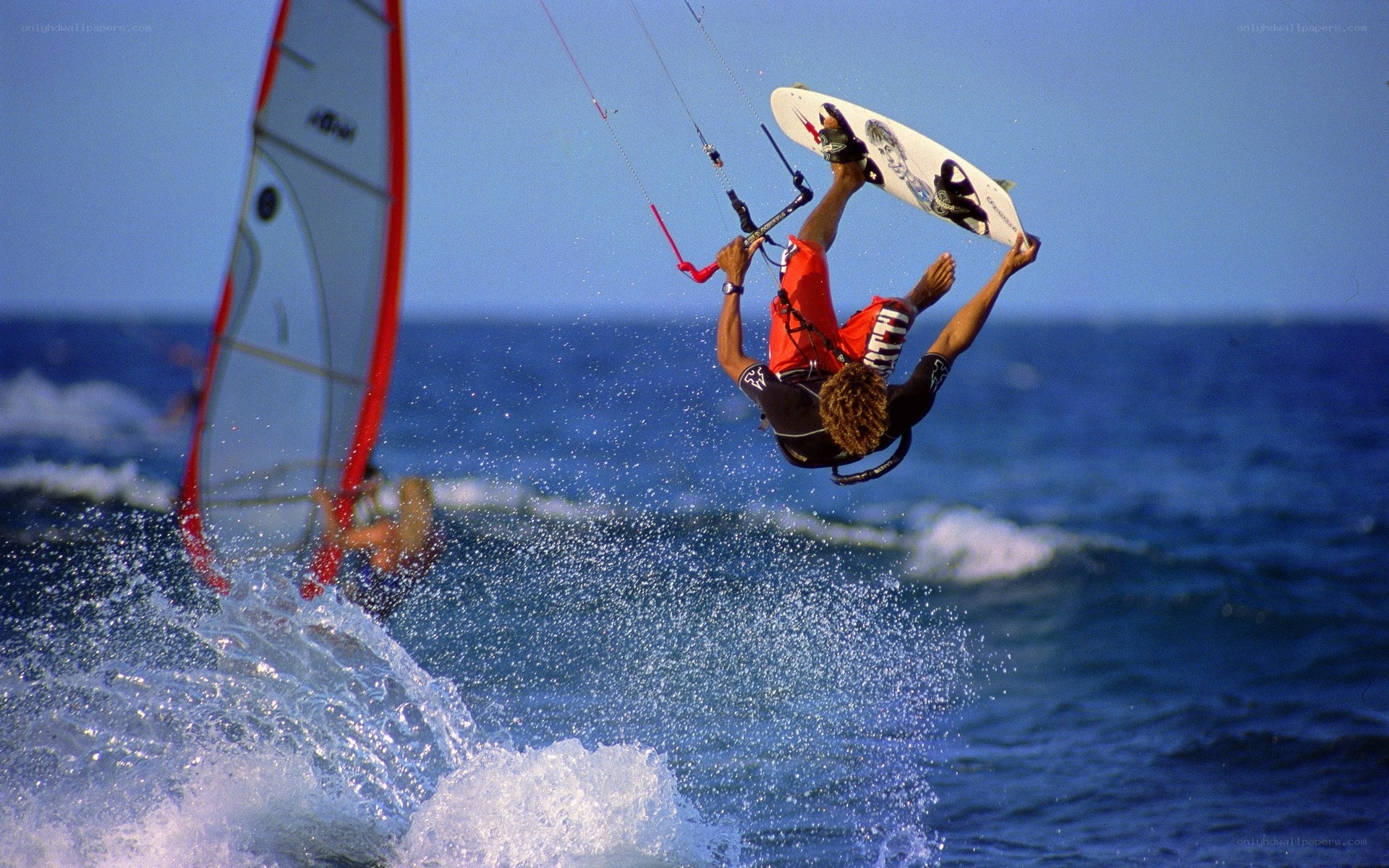 kitesurfer performing aerial trick