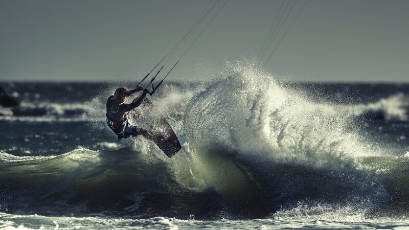 Kitesurfer Riding Wave — Blue