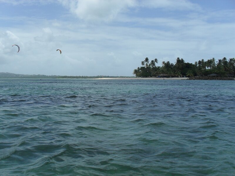 Kitesurfers over Ocean
