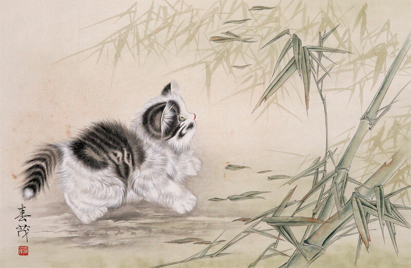 Kitten Near Bamboo