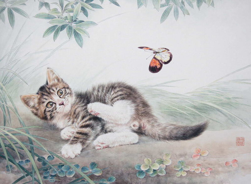 Kitten Playing with Butterfly
