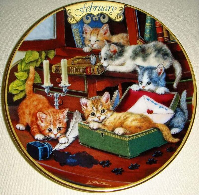 Kittens on a Desk