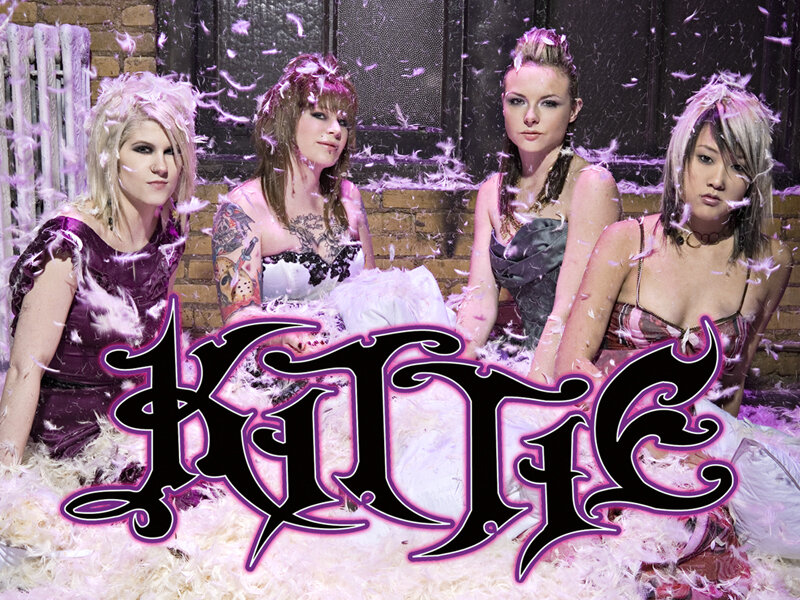 Kittie band photo with feathers