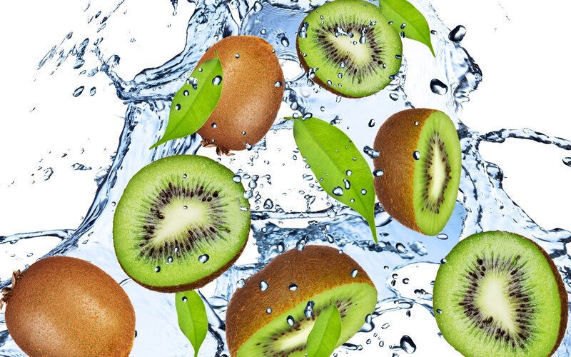 kiwi fruit splashing in water