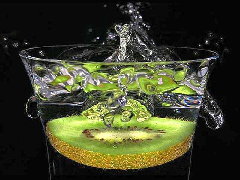 kiwi slice in splashing water