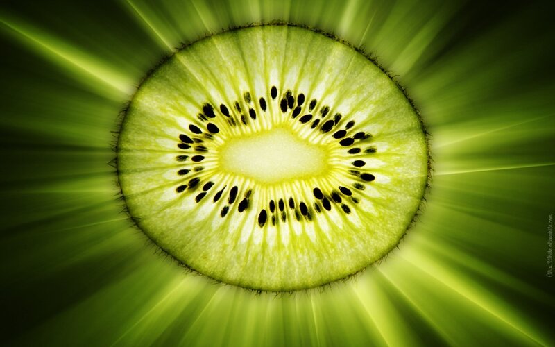 kiwi slice with radiant green background