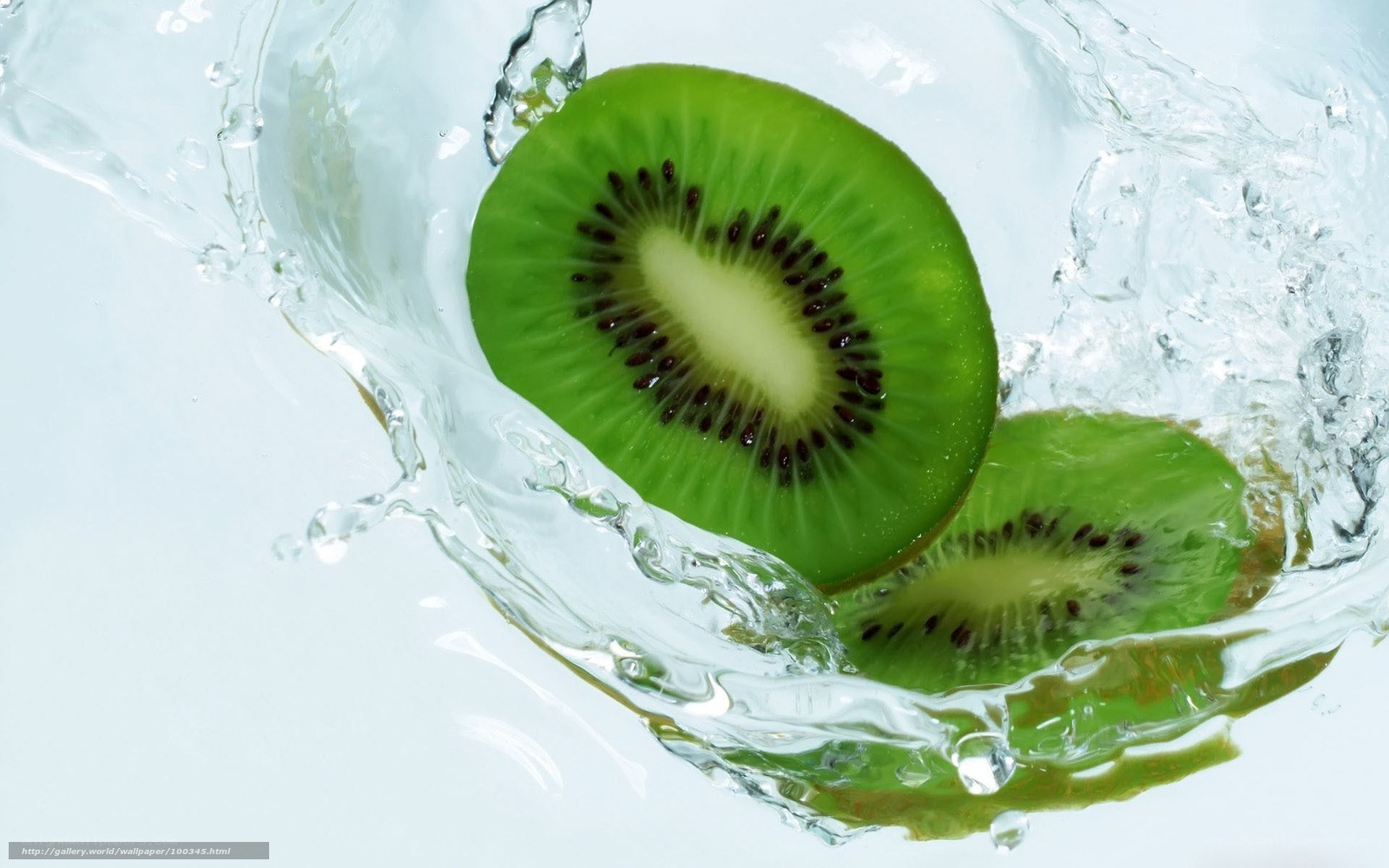 kiwi slices in water splash