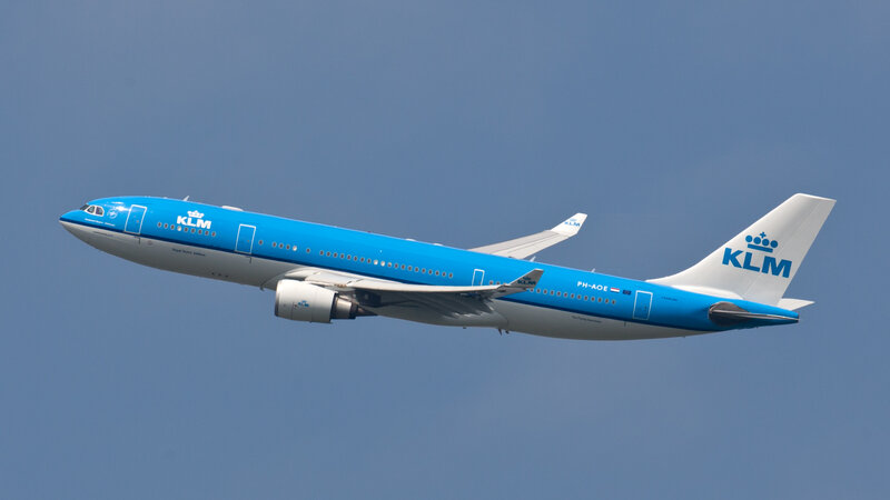 KLM Airplane in Flight — Blue, Calm, Photograph