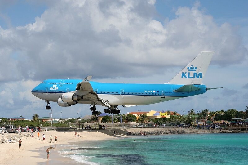 KLM airplane landing near beach