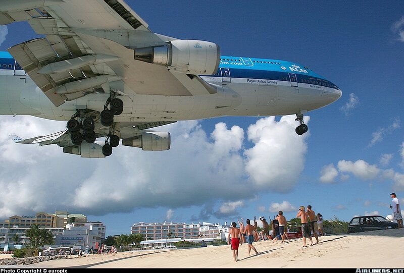 KLM airplane landing near beach