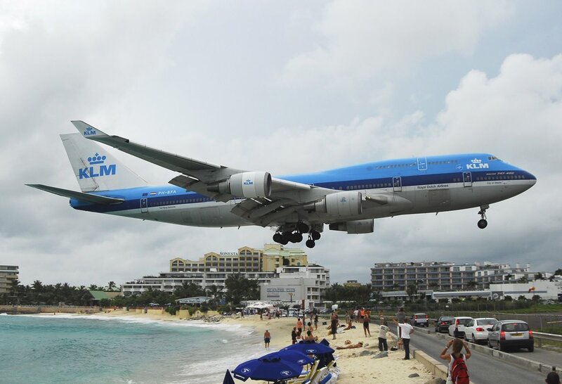 KLM plane landing near beach