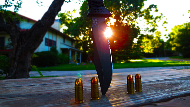 Knife and Bullets on Table