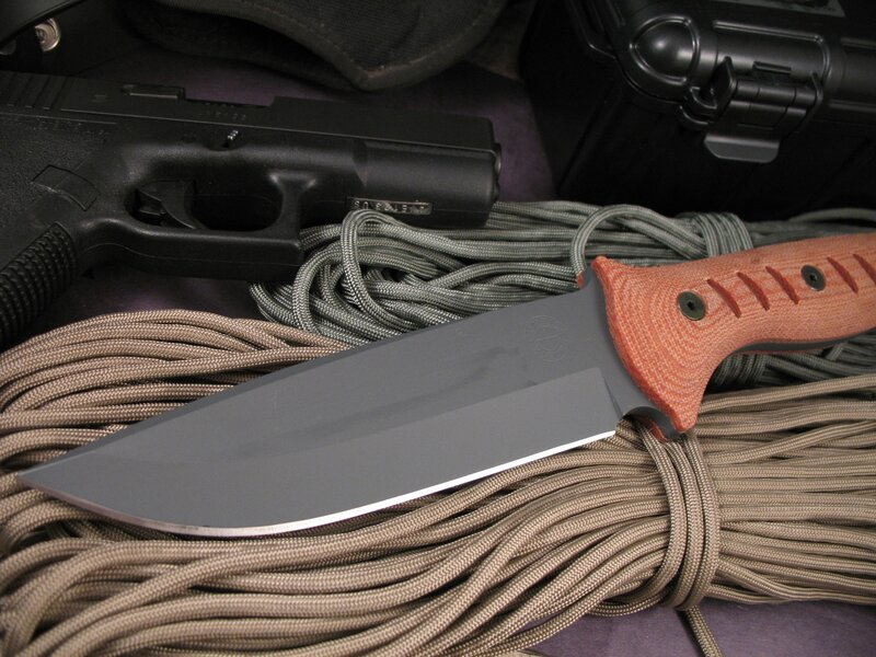 knife and gun with paracord