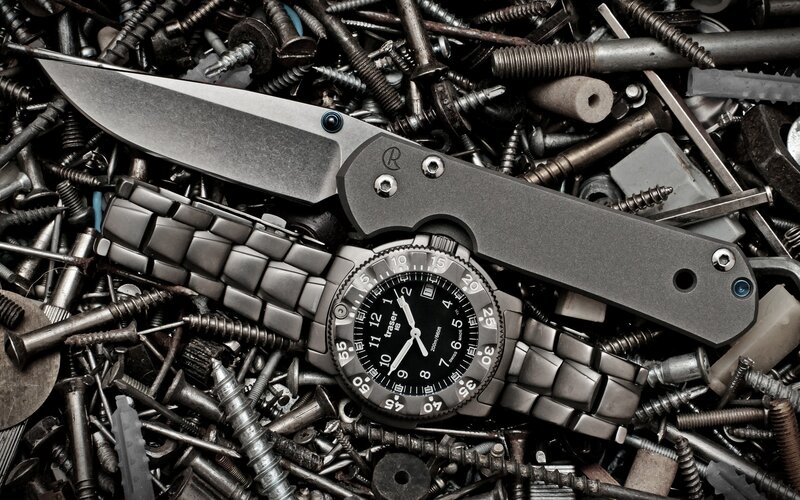 knife and watch on screws