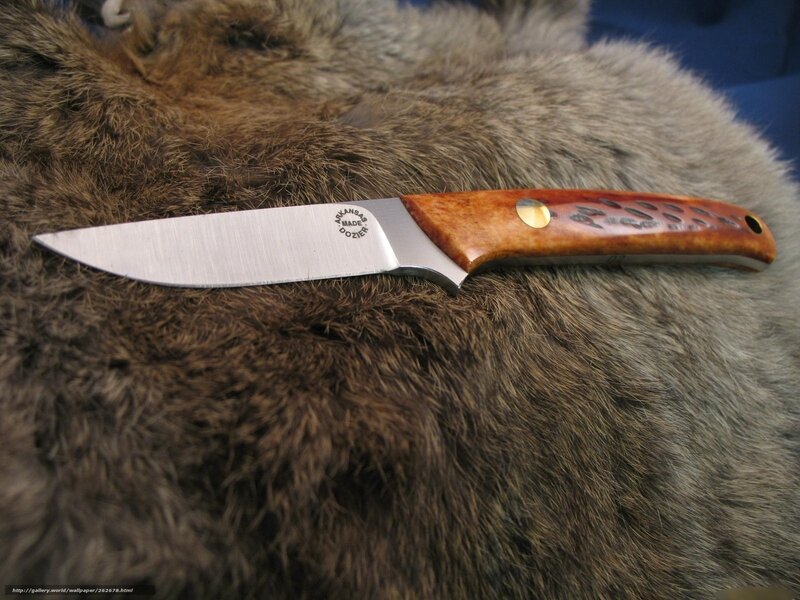 knife on fur surface
