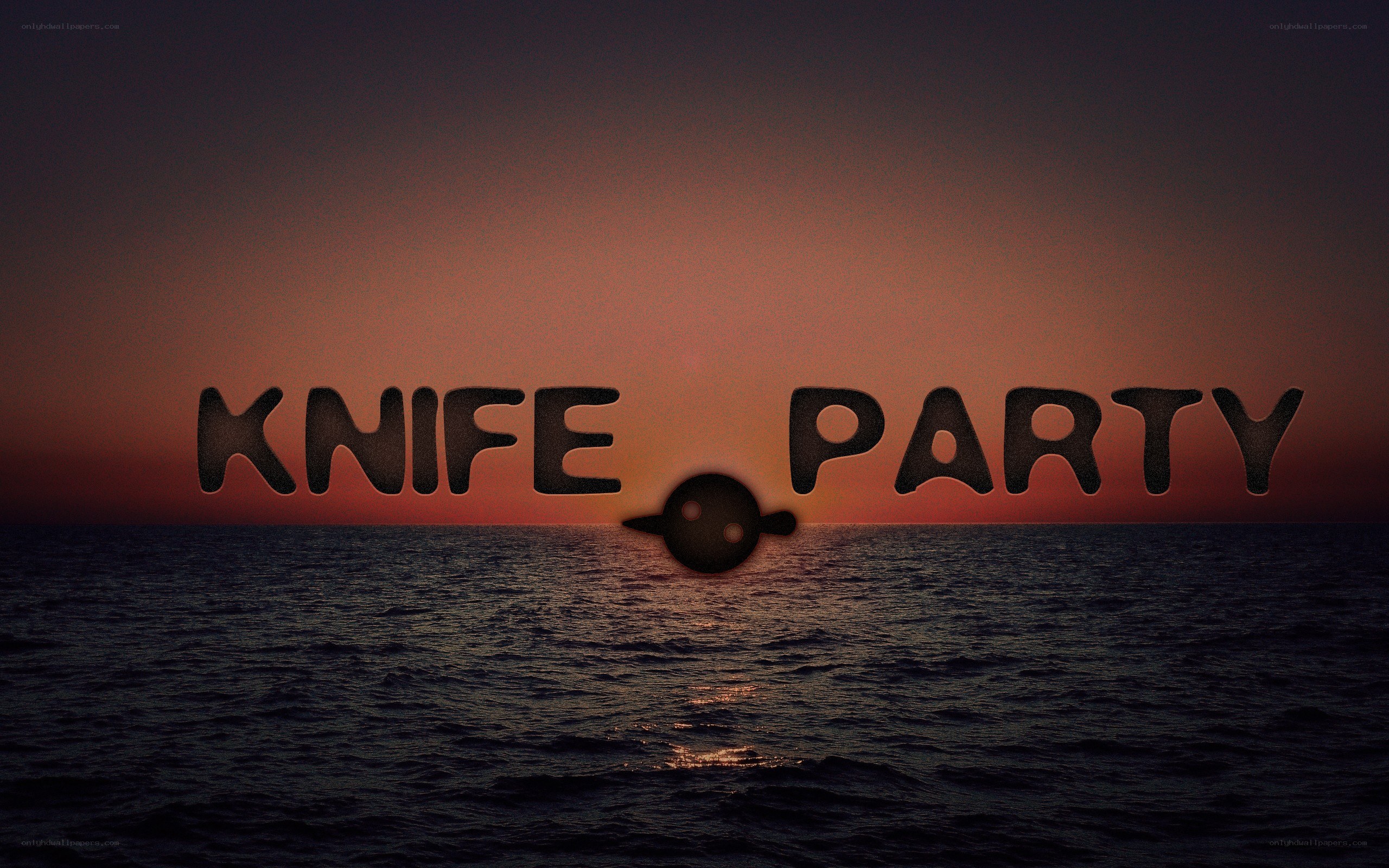 Knife Party logo at sunset
