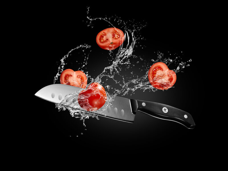Knife Slicing Tomatoes
