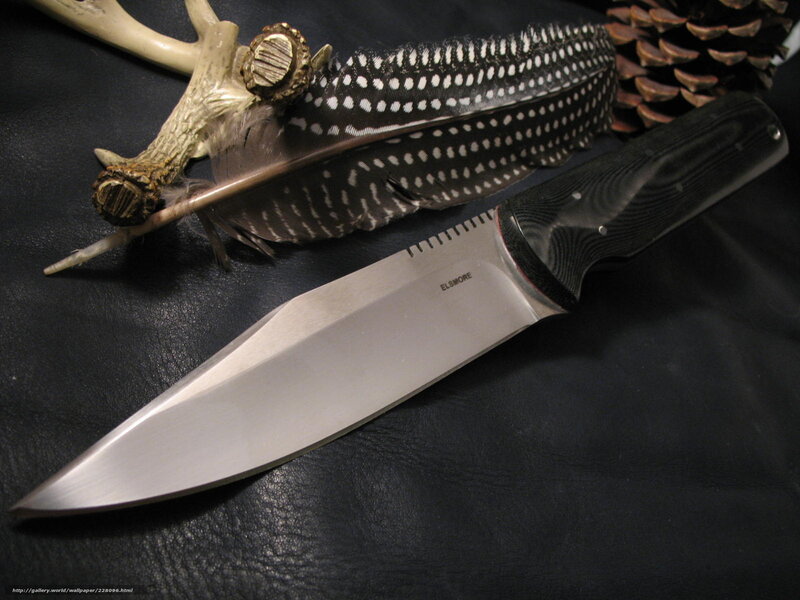 knife with feather and antler