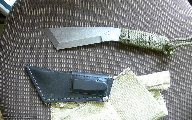 knife with sheath on fabric