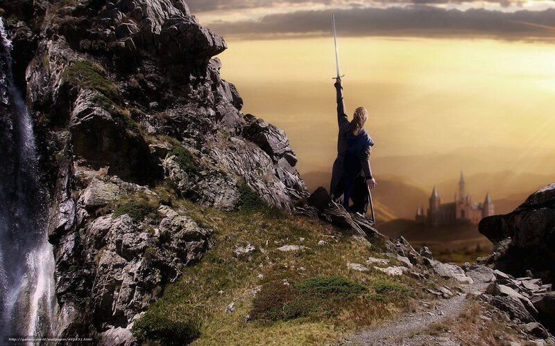 Knight on a mountain at sunset