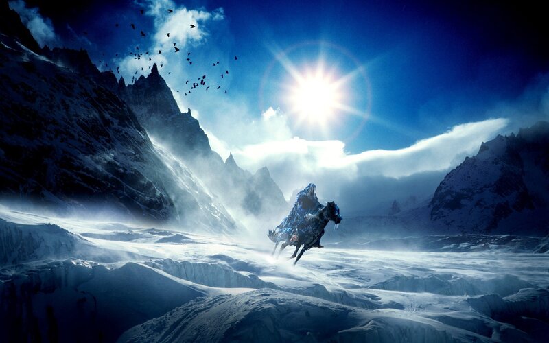 Knight on horse in snowy mountains