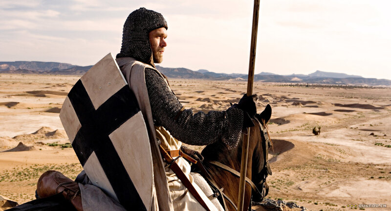 Knight on horseback in desert