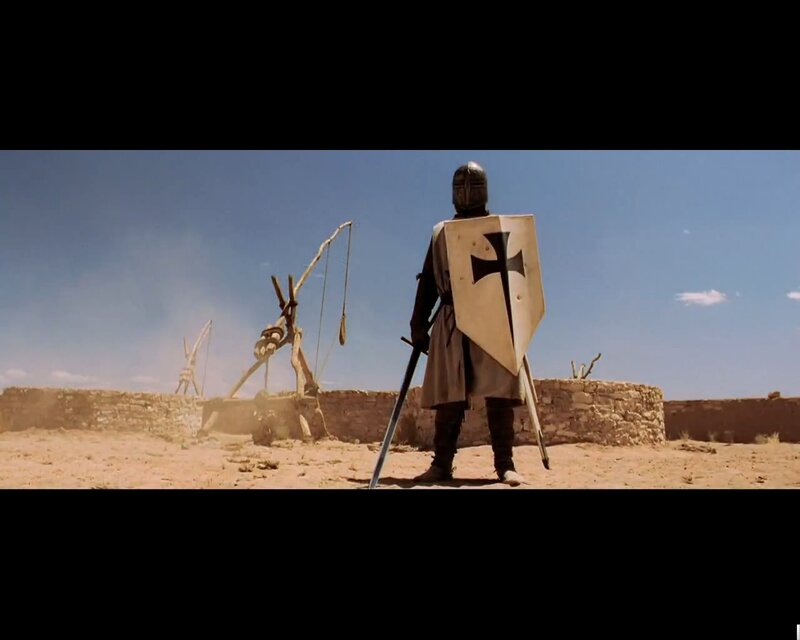 knight stands before siege