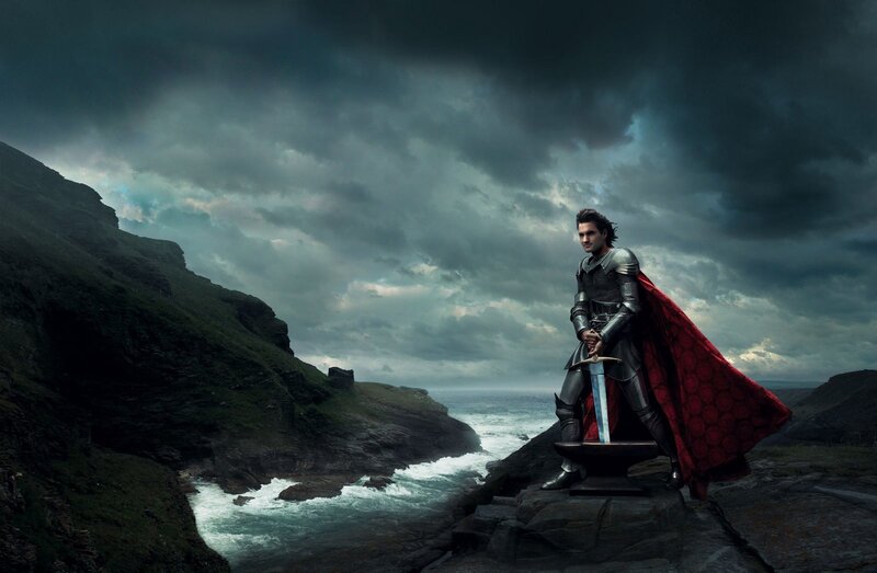 knight with sword on cliff