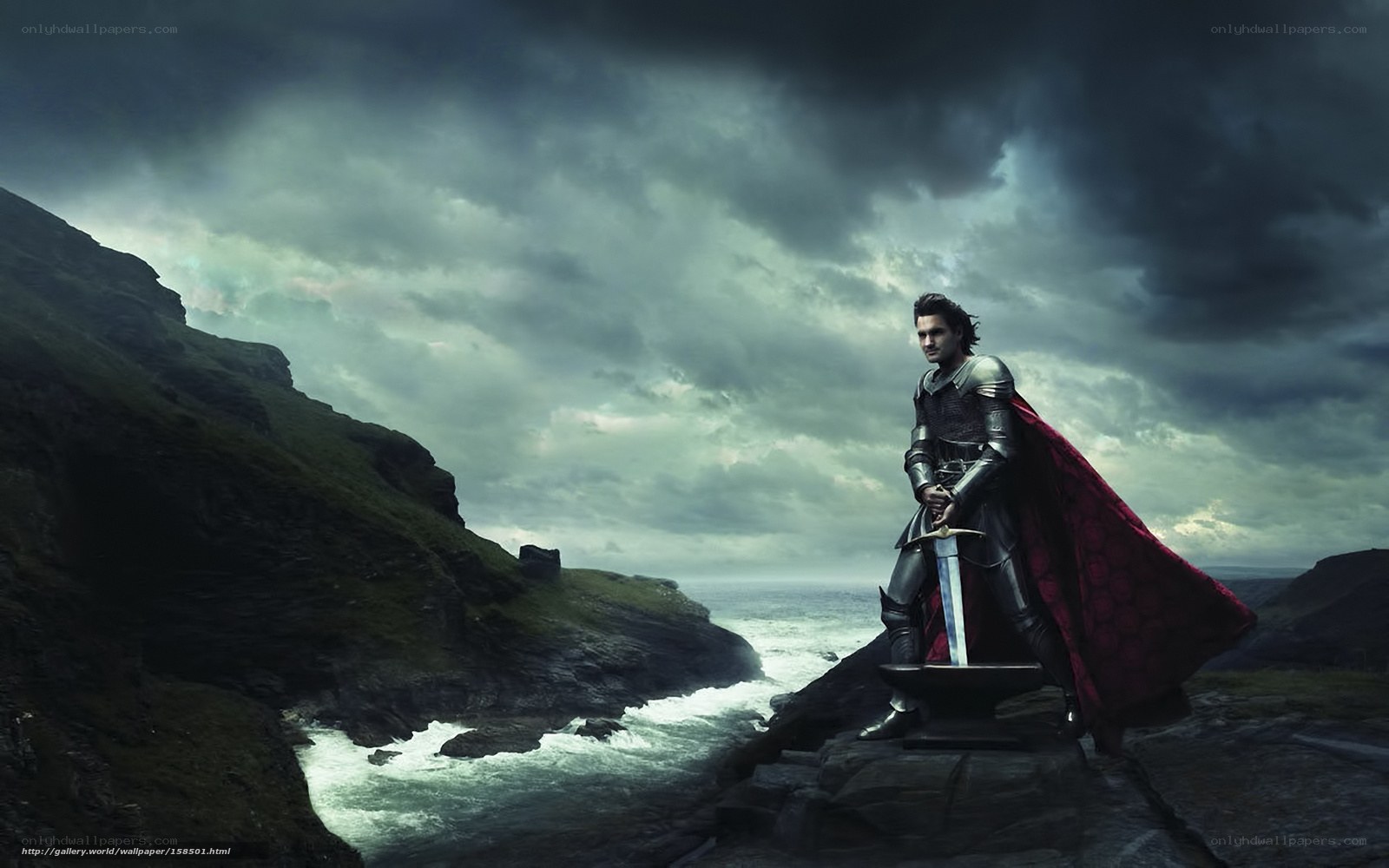 knight with sword on cliff