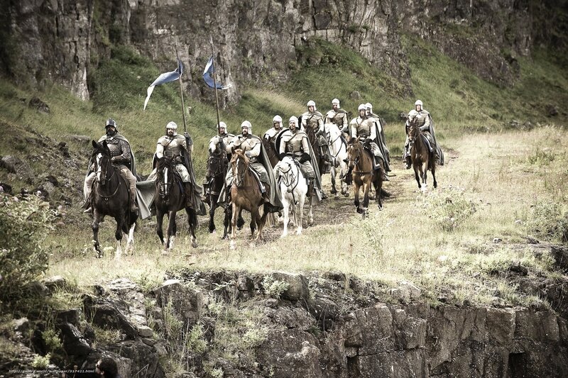 Knights on horseback in a valley
