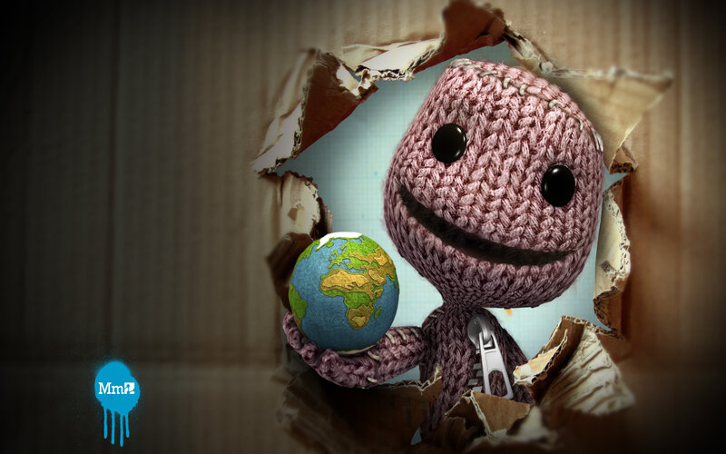 knitted character holding globe