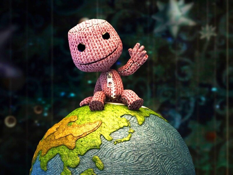 knitted character on globe