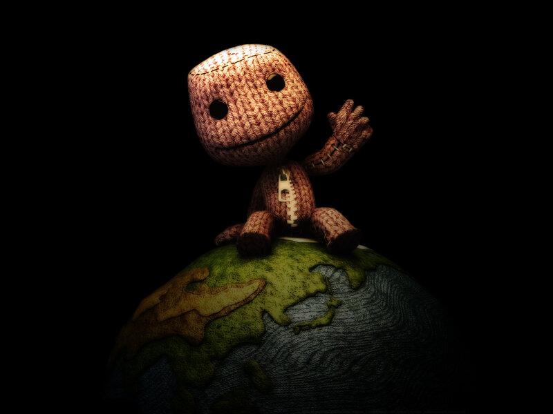 Knitted Character on Globe — Brown