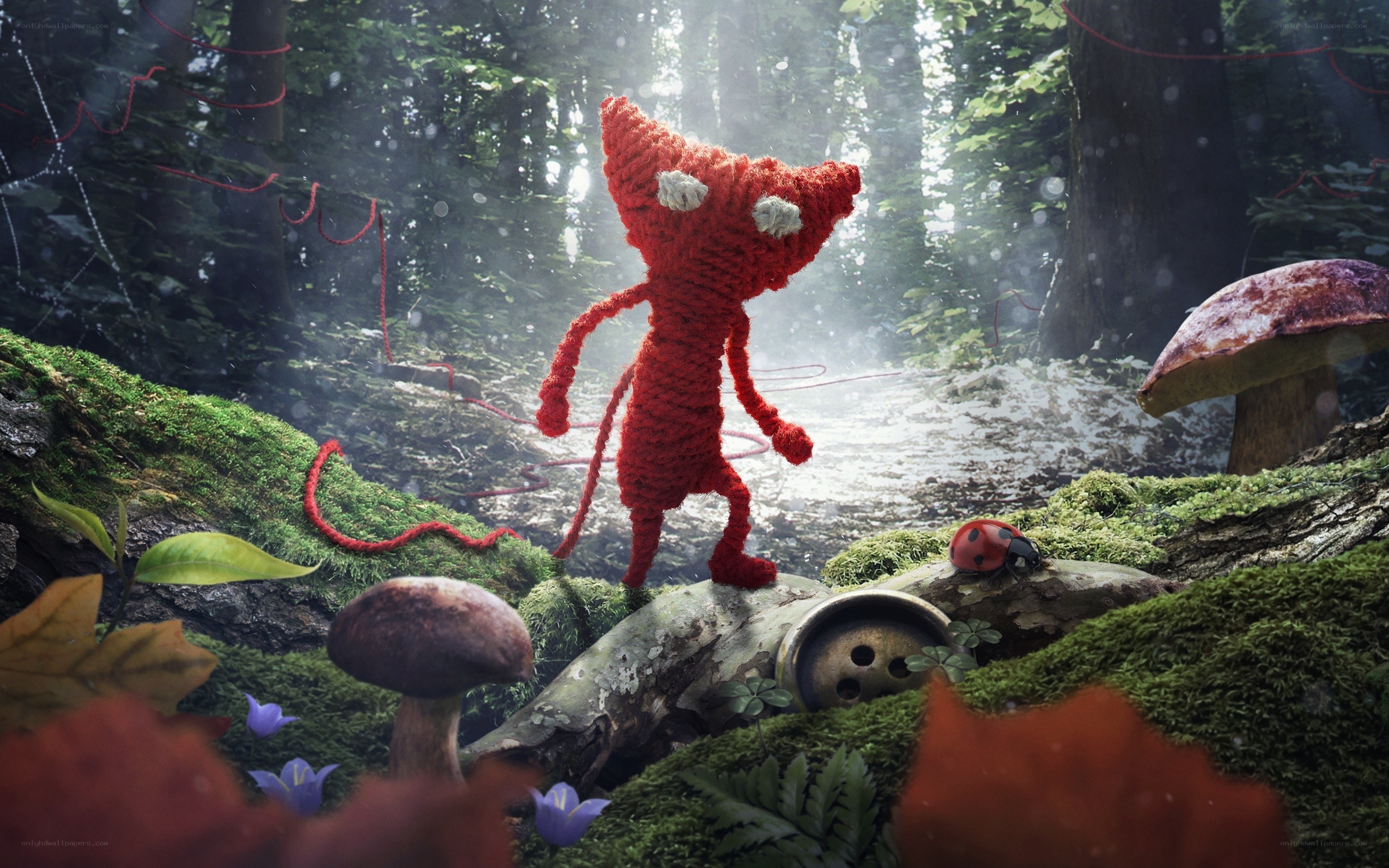 Knitted creature in forest