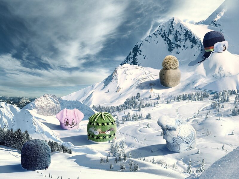 Knitted hats in snowy mountains