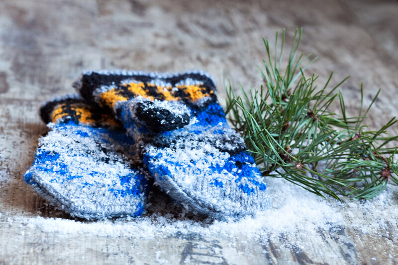 Knitted Mittens with Snow
