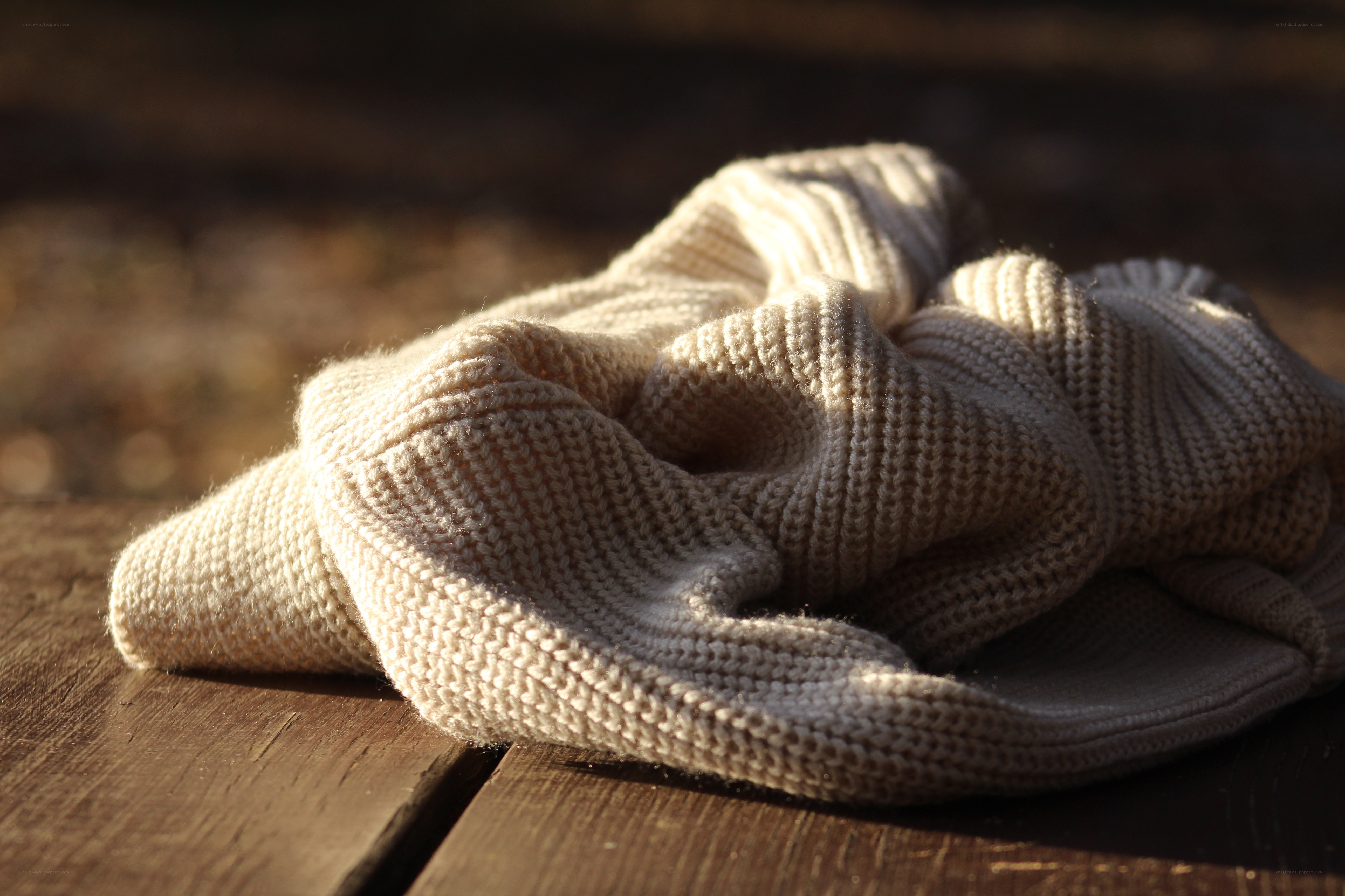 knitted scarf on wood