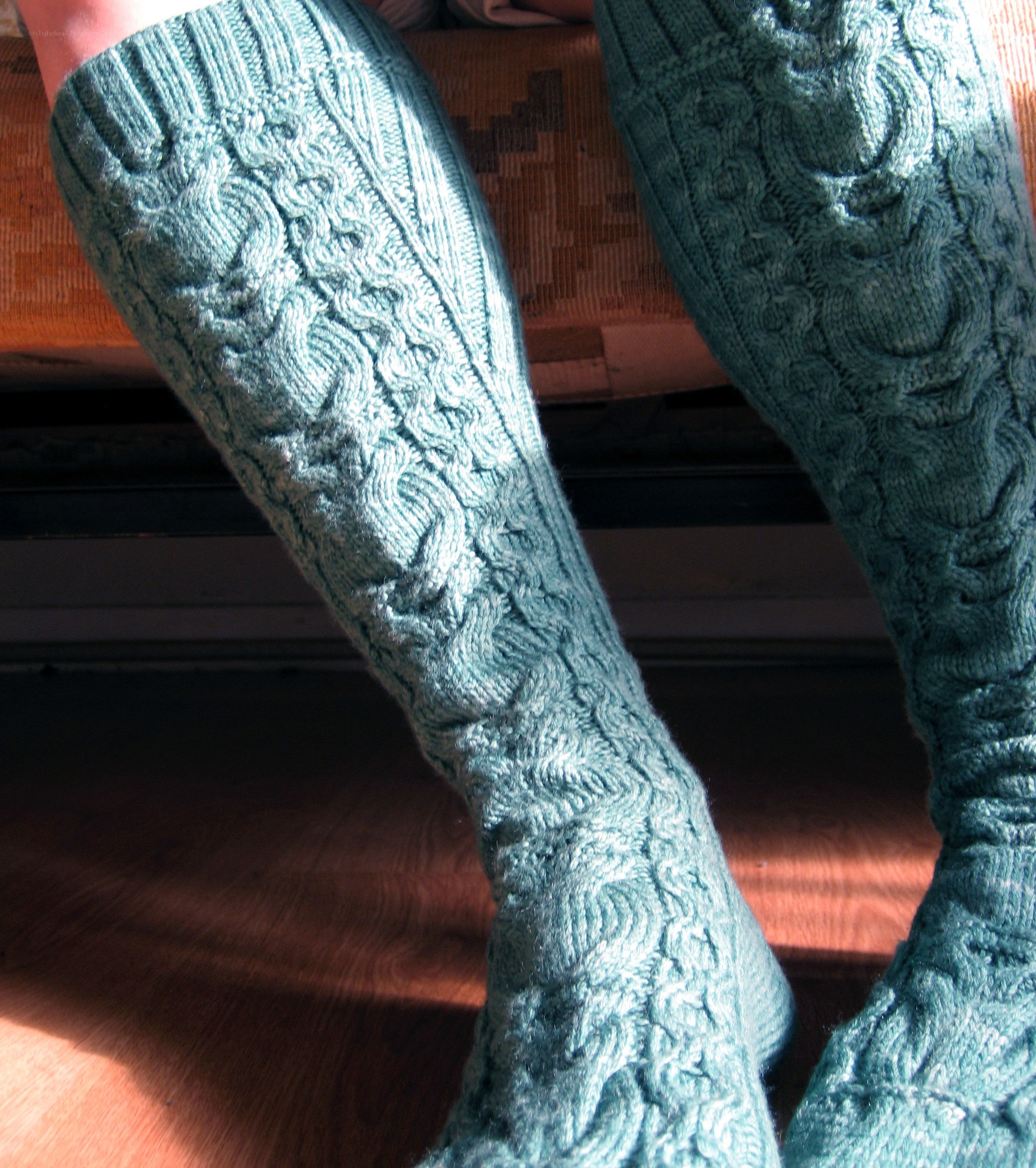 knitted socks on legs