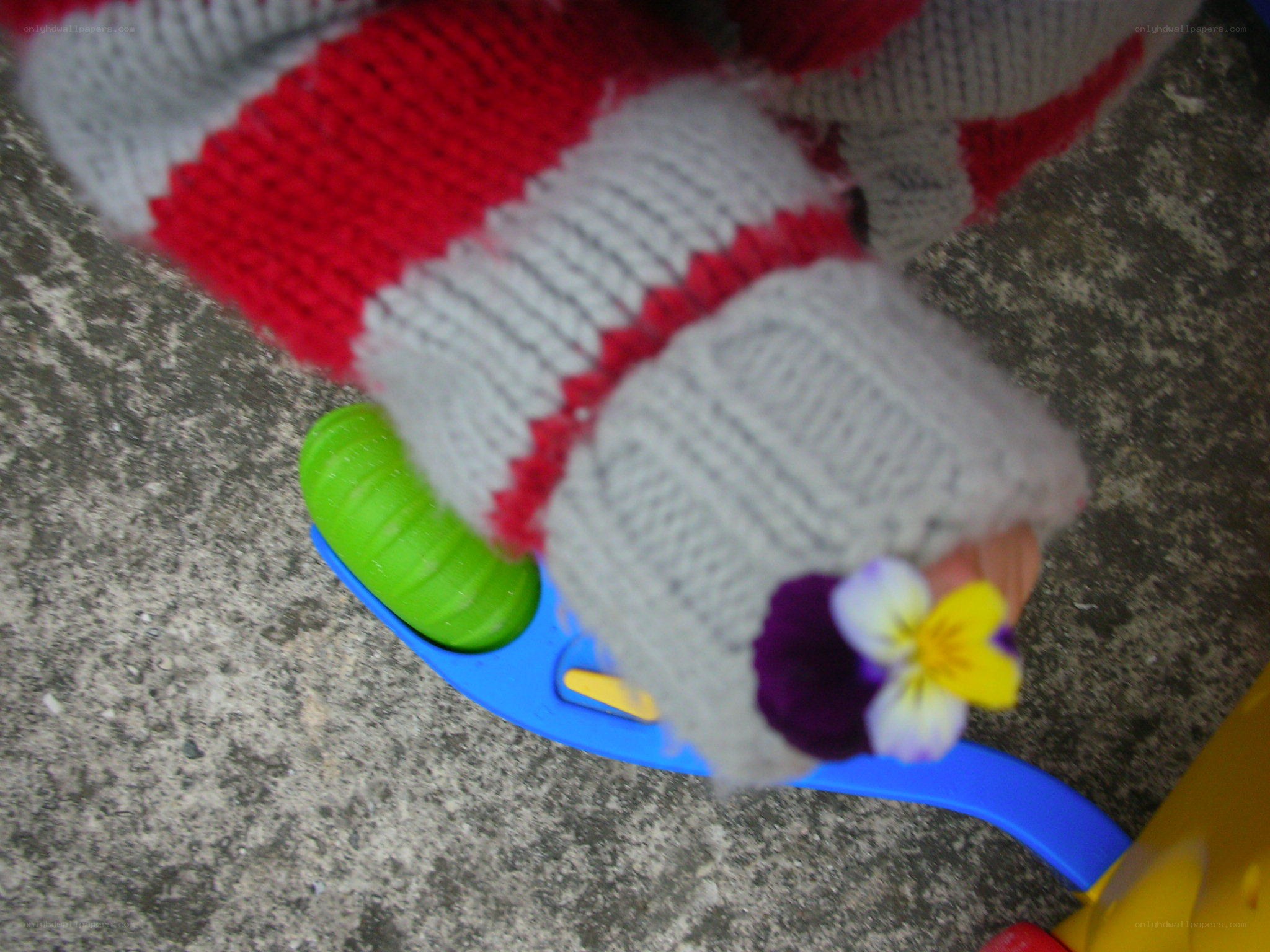 knitted toy with flower
