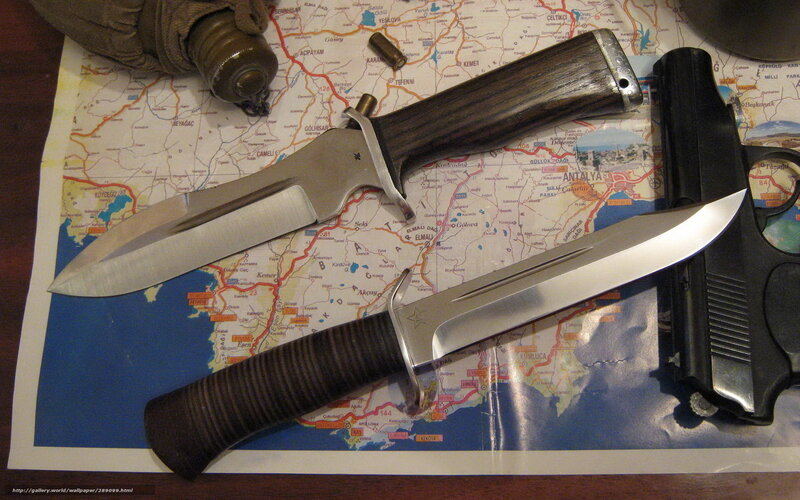 Knives and gun on map