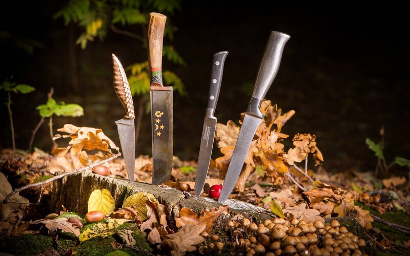 Knives in a forest setting