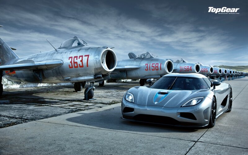 Koenigsegg and jets on tarmac