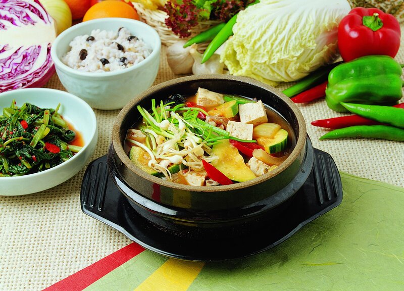 Korean tofu stew with side dishes