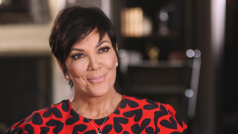 Kris Jenner in red and black dress