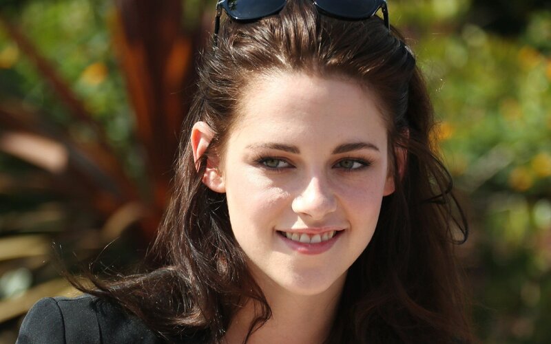 Kristen Stewart smiling outdoors