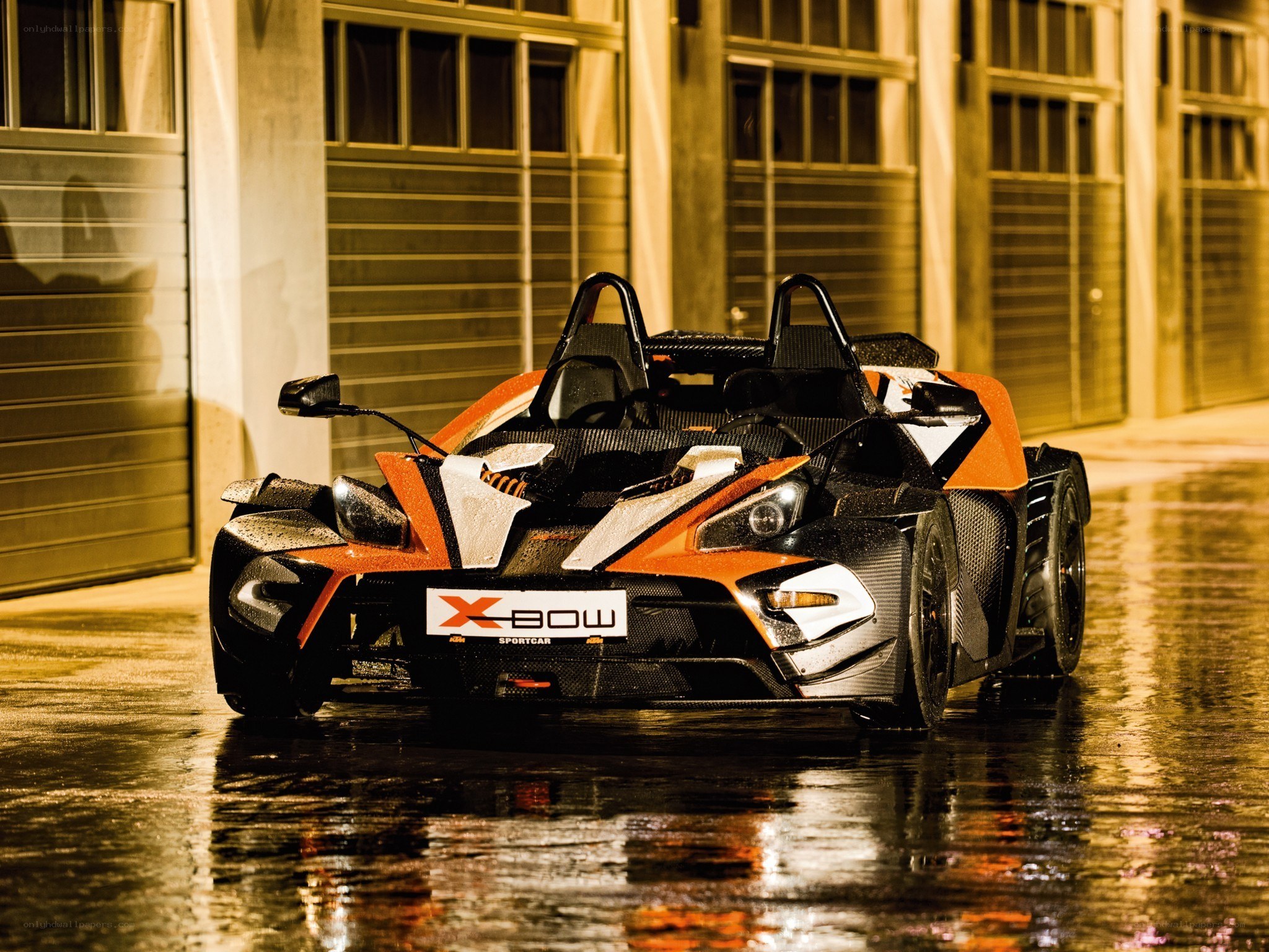 KTM X-Bow on wet pavement